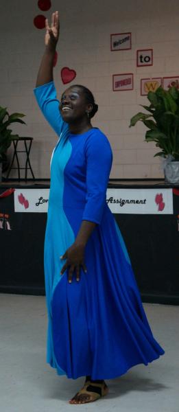 PICTURE OF LAVERNE D JOSEPH CAPTURED  AS SHE MINISTERS IN A PRAISE DANCE AT AN EMPOWERED WOMEN CONFERENCE